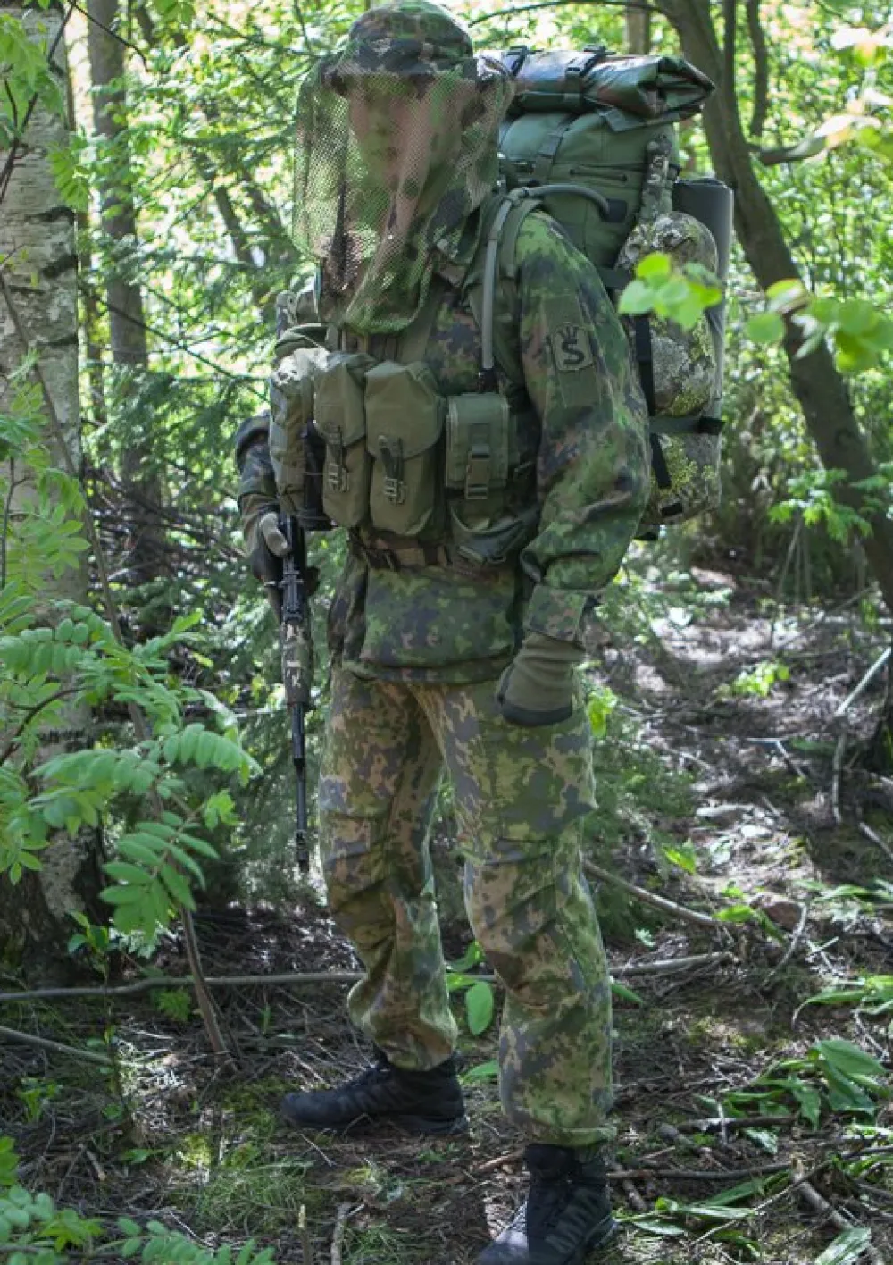 Varusteleka Tunnukset ^ Suojeluskunnan hihamerkki, kenttävärit